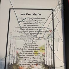 a glass frame with a poem written in it