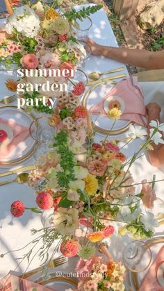 a table with plates and flowers on it that says summer garden party written in large letters