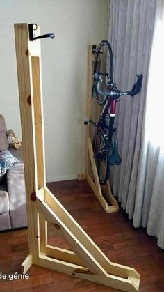 a bike rack in the corner of a living room