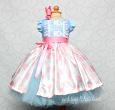 This dress is perfect for your little one who loves toy story! Made to resemble Bo Peep,this will be perfect for your little ones party,Special event or special photos!This dress is made knee length, Hairbow is includedCheckout our other toy story designs! Just search toy story in the search bar!If you are unsure of sizing please scroll to the last photos for our size charts, or visit our size charts here--> https://pinktoesnhairbows.com/pages/size-chartAll sales are FINAL, Ship dates can be fou Playful Fitted Princess Dress With Ruffles, Playful Fitted Ruffled Princess Dress, Whimsical Tutu Dress For Easter Dress-up, Cute Tutu Dress For Easter Dress-up, Princess Style Fitted Dress For Easter, Fitted Princess Dresses For Easter, Fitted Princess Style Easter Dresses, Whimsical Fitted Princess Dress With Ruffles, Cute Blue Tutu Dress For Costume Party