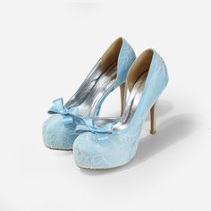 Lady Bella is a pair of custom made shoes in sweet baby blue satin. This pair of wedding heels features silky satin fabric with ivory white lace overlay. The front of this bridal heel features a dainty bow and the 4.5 inch heel of this bridal shoe is finished in silver glitter fabric. This pair of shoes is made using satin, glitter, lace, PU and other synthetic materials. They can be customized in different heel heights, colors and styles. They come with 0.5 inch elevated platform front. CUSTOMI Satin Closed-toe Wedding Shoes, Satin Closed Toe Wedding Shoes, Closed Toe Satin Heels For Wedding, Satin Closed Toe Heels For Wedding, High Heel Satin Wedding Shoes, Satin High Heel Wedding Shoes, Fitted Satin High Heel Wedding Shoes, Light Blue Round Toe Evening Wedding Shoes, Elegant Light Blue Wedding Shoes For Formal Occasion