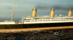 a large white ship floating on top of the ocean