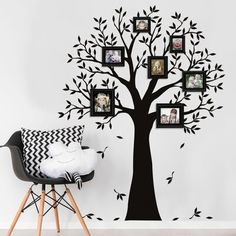 a family tree wall decal with four frames on it