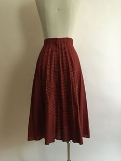 "Lightweight red plaid 1970s circle skirt zips up in the back with a single button at the waist to secure closure. Skirt has vague permanent pleats and is made of a very lightweight poly/cotton blend. In very good vintage condition. There is only one label present,\"DRY CLEAN ONLY\". Waist 26\" Hips 28\" Length 28\"" Silk Chiffon Dress, Beaded Bodice, Dress Out, Circle Skirt, Silk Chiffon, Red Plaid, Empire Waist, Chiffon Dress, High Fashion