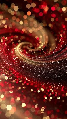 an abstract red and gold background with many small circles in the shape of a spiral