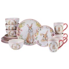 an assortment of porcelain dishes and cups with rabbits on the front, in various designs