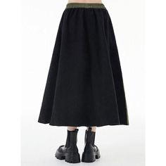 Discover Your New Favorite Skirt Step into the world of casual elegance with our Green & Black Asymmetric A-Line Skirt, a perfect blend of style and comfort for any season. Whether you're strolling through a spring garden or enjoying an autumn evening, this skirt's versatile design makes it an essential addition to your wardrobe. Product Features Size: One Size fits most, with a comfortable stretch from 26.8" to 44.9" at the waist. Length: Graceful mid-calf length at approximately 32.3 inches. Material: A harmonious blend of cotton and polyester, ensuring both comfort and durability. Style: A striking patchwork design in green and black, crafted in a flattering A-line silhouette. Season: Ideal for any season, this skirt pairs well with both summer tops and winter layers. Why Choose Our Asy Trendy Long Skirt For Fall, Trendy Relaxed Winter Skirt, Spring Asymmetrical Hem Pleated Maxi Skirt, Spring Pleated Maxi Skirt With Asymmetrical Hem, Spring Black Cotton Skirt, Asymmetrical Hem Pleated Maxi Skirt For Spring, Flowy A-line Skirt For Fall, Casual Black Maxi Skirt For Winter, Black A-line Maxi Skirt For Winter