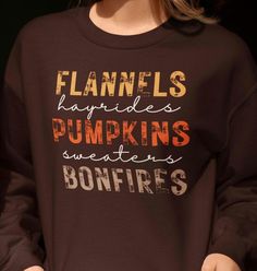 Flannels, hayrides, pumpkins, sweaters, and bonfires - this crewneck sweatshirt embodies the cozy and festive vibes of autumn. Perfect for those looking to stay warm and stylish during the colder months, this sweatshirt is ideal for anyone who loves fall activities and embraces the spirit of the season. Great for Thanksgiving, Halloween, and everyday wear. Product features - Medium-heavy fabric blend of 50% cotton and 50% polyester for coziness - Classic fit and crew neckline for comfort - Double-needle stitching for durability - Ethically made with US grown cotton - OEKO-TEX-certified dyes for low environmental impact Care instructions - Machine wash: cold (max 30C or 90F) - Non-chlorine: bleach as needed - Tumble dry: low heat - Do not iron - Do not dryclean Crew Neck T-shirt For Camping In Fall, Fall Text Print Sweatshirt, Fall Crew T-shirt With Text Print, Fall Crew Neck T-shirt With Text Print, Cozy Text Print Sweatshirt For Fall, Fall Flannel, Fall Activities, Autumn Vibes, Fall Sweatshirt