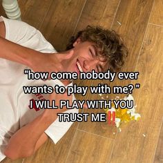 a man laying on the floor next to a bottle of beer and flowers with text that reads, how come nobody ever wants to play with me? i will play with you trust me