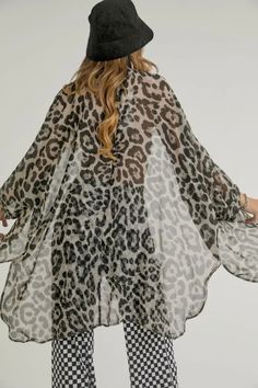 Unleash your fierce side with this black leopard print kimono. Perfect for adding some edge to any outfit, this kimono is sure to make a statement. Channel your inner wildcat with this stylish piece. STYLE STEAL! Leopard Kimono, Style Steal, Black Leopard Print, Print Kimonos, Black Leopard, Kimonos, Wild Cats, Leopard Print, Black