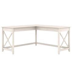 the corner desk is white and has an x - frame design on one side, and two