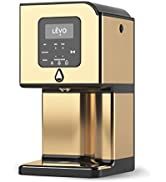 an image of a gold and black coffee maker