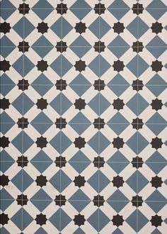 a blue and white tiled floor with black stars