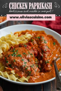 chicken parmesan with red sauce and pasta in a white bowl on a wooden table