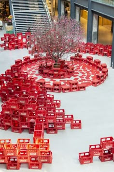 red crates are arranged in the shape of a circle