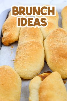 bread rolls on a baking sheet with the words brunch ideas