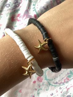 Black and white starfish clay bead bracelet set. Item pictured is item for sale.  See other listings for additional color options, sizes and options as well as to save on shipping!  We also accept personalized requests with approximate 1 week turn time.  Please don't hesitate to reach out with any questions prior to purchase. White Beaded Bracelet With Starfish Charm As Gift, White Adjustable Beaded Bracelet With Starfish Charm, Handmade White Starfish Bracelets, Adjustable White Beaded Bracelet With Starfish Charm, Adjustable White Starfish Beaded Bracelets, Adjustable White Jewelry With Starfish Charm, Personalized White Jewelry For Vacation, White Heishi Beads Friendship Bracelets For Vacation, Adjustable White Bracelet With Starfish Charm