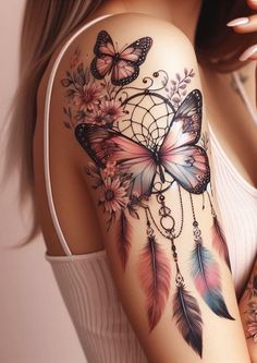 a woman with butterfly tattoos on her arm