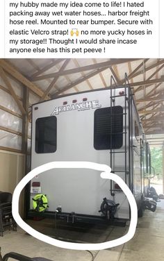 an rv parked in a garage with the caption that reads, my hubby made't water hoses