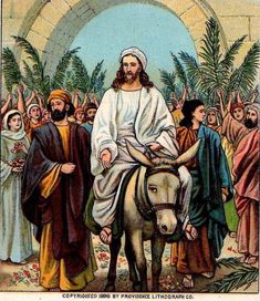 jesus riding on the back of a donkey surrounded by people