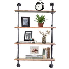 a shelf with books, pictures and an alarm clock on the top is against a white background