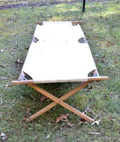 Vintage Folding Cot Wooden Frame Worn Canvas Fabric Military Cot Bed Camping Bed Rustic Primitive Day Bed Wood Frame Cot PanchosPorch Vintage folding cot with wooden frame. Very worn and distressed canvas fabric. Old military cot or camping bed. Rustic and primitive. Add a new cover and this will be an awesome piece! Great for a cabin, kids room, porch.... Good condition. Sturdy.  Measures 75"  x 28", 18"  high when opened. Closed- 38" x 8" x 6". I do my best to describe my items well. Zoom in on my pictures and should you have any questions, please ask! By purchasing any item in my shop, you are agreeing that you read the full description including photos. WE DO NOT ACCEPT RETURNS, EXCHANGES OR CANCELLATIONS. COMBINED SHIPPING: If you are interested in more than 1 item, shipping costs may