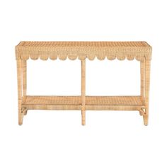 a wicker shelf with scalloped edges on the top and bottom, against a white background