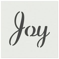 the word joy written in cursive black ink on a white paper with a gray background