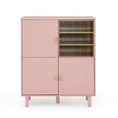 a pink cabinet with two doors and shelves on one side, in front of a white background