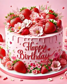 a pink birthday cake with strawberries and flowers on the top that says happy birthday