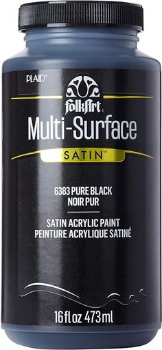 a bottle of paint that is blue and has black writing on it with the words multi surface