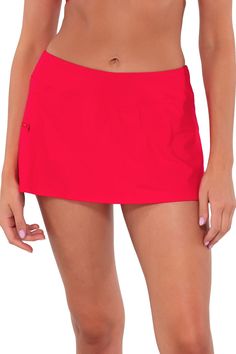 The Sporty Swim Skirt will become one of the most versatile pieces in your swimwear collection. This skirt is ideal for women who want more coverage along with functionality. Featuring hidden attached shorts and a wide waistband, it will keep you comfortable on those busy summer days. Also includes a side zipper pocket and a mid-rise fit. A Skirt for All Day: Wear this full-coverage bottom to the beach and beyond! Find Your Perfect Fit: Available in sizes XS through 16, with plus sizing in solid Swim Skirt With Built-in Shorts For Swimming, Solid Color Swim Dress With Built-in Shorts, Beach Season Skirted Bottoms With Built-in Shorts, Skirted Bottoms With Built-in Shorts For Beach Season, Beach Season Swim Dress With Built-in Shorts, Beachwear Skirt With Built-in Shorts For Poolside, Poolside Swim Skirt With Built-in Shorts, Stretch Tennis Skirt With Built-in Shorts For Beach, Beachwear Swim Skirt With Built-in Shorts