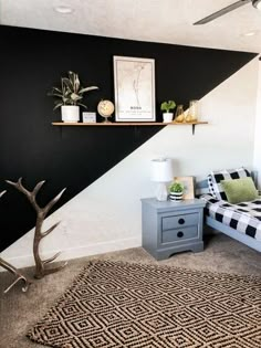 a black and white striped wall in a bedroom