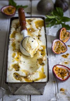 an ice cream dish with fruit on the side