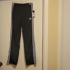 Nwt: Adidas Track Pants 3-Stripes And Adidas Trefoil Logo Regular Fit Drawstring Elastic Waistband Side Pockets Comfy And Sporty Style Show Off Classic Adidas Design. Size: L (14-16) Color: Black And White Smoke Free And Pet Free Home Hockey Pants, Soccer Pants, Adidas Bottoms, Adidas Sweats, Boy Sweatpants, Adidas Design, Classic Adidas, Adidas Three Stripes, Adidas Joggers