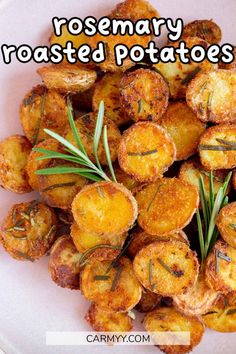 crispy rosemary roasted potatoes on a white plate