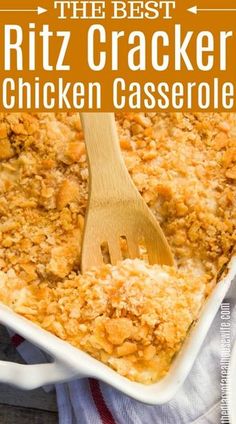 the best ritz cracker chicken casserole in a white dish with a wooden spoon