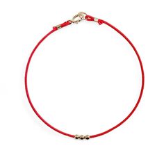 Discover the subtle charm of our Red String Bracelet, a blend of simplicity and sophistication. Adorned with shiny 2.5mm 14K solid gold round beads and a matching clasp, each bracelet is designed to complement your wardrobe while inviting fortune and protection into your life. Red String Bracelet, Red String, String Bracelet, Glass Necklace, Gold Beads, Red Gold, Round Beads, Bead Charms, Crystal Beads