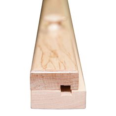 a close up view of a wooden object on a white background