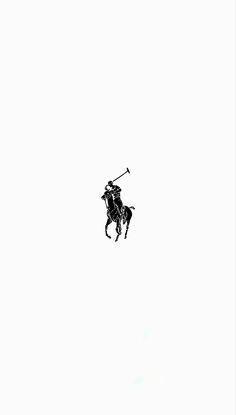 a black and white photo of a person on a horse in the air with a stick