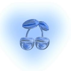 two blue glass objects are sitting on top of each other in front of a white background