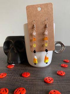 One of a kind long drop candy corn earrings! Made with crystal beads and glass candy corn beads. Perfect for Halloween and makes a great gift! * All materials were cleaned and sanitized prior to use and kept in a clean smoke free environment. Comes packaged in a mesh drawstring bag. Corn Bead, Corn Earrings, Candy Corn Earrings, Halloween Bracelet, Halloween Candy Corn, Halloween Bags, Colorful Accessories, Glass Candy, Halloween Jewelry