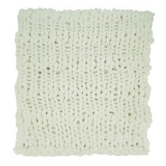 a white knitted pillow on a white background