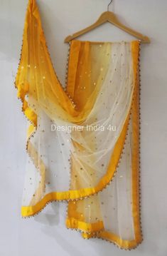 This is a Dupatta made on orders. It is made using net fabric with gold sequinces embroidery all over. We make it colored as shown in the picture. Then we stitch a beautiful golden lace to all sides of it. Dupatta is having a length of 100 inches and width of around 40 inches. I don't keep it readymade I only make it exclusively for my customers. Can be fully customised. Duppattas Designs Ideas, Mint Outfit, Party Wear For Women, Bridal Lehenga Designs, Suit Salwar, Floral Frocks, Girls Party Wear, Lehenga Suit, Golden Lace