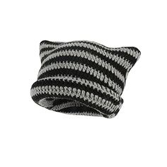 a black and white knitted hat on a white background