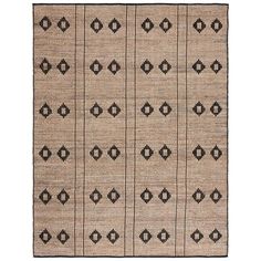 an old rug with black and white designs on the front, in various sizes and colors