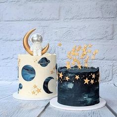 two cakes decorated with stars and moon designs