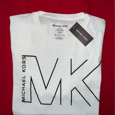 Michael Kors Logo T-Shirt 100% Cotton Size: L Nwt New! Michael Kors Womens / Men/ Unisex White T-Shirt Style Mk Logo - Soft 100 % Cotton Blend New // Never Worn Before Please Refer To Pictures And Ask Questions. White Tee Men, 2024 Clothes, Men Logo, Mens Tshirts Fashion, Black Shorts Men, Michael Kors Logo, Guy Harvey, Mens Designer Shirts, Michael Kors Men