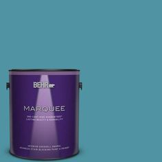 a pink paint with the words marquee on it and a blue canister