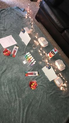 the table is covered with papers and other items that have been placed on top of it